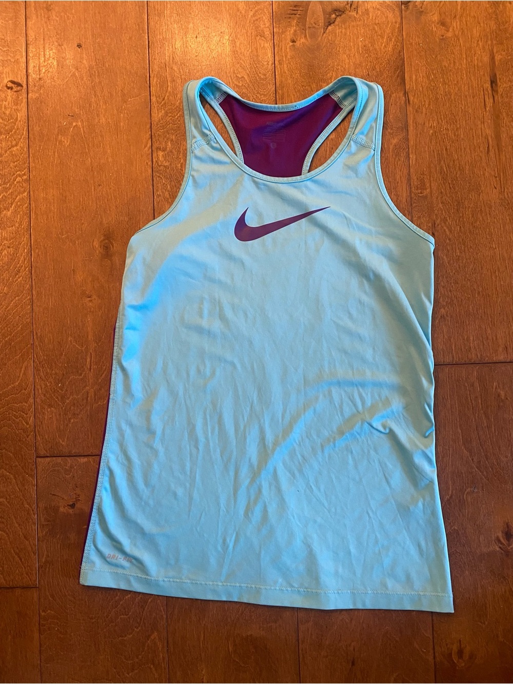 Nike Women’s Light Blue and purple Dri-FIT Racerback Tank. Size S